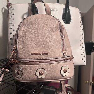 Michael Kors Preloved Mini back pack with detachable long straps